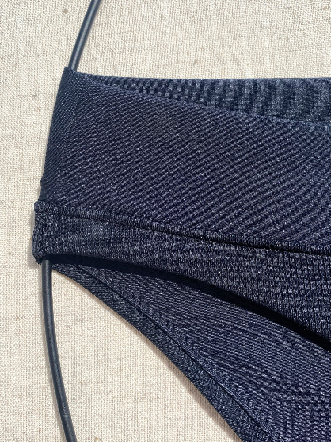Bikini bottom classic in black with rib fabric and embroidery, soft waistband