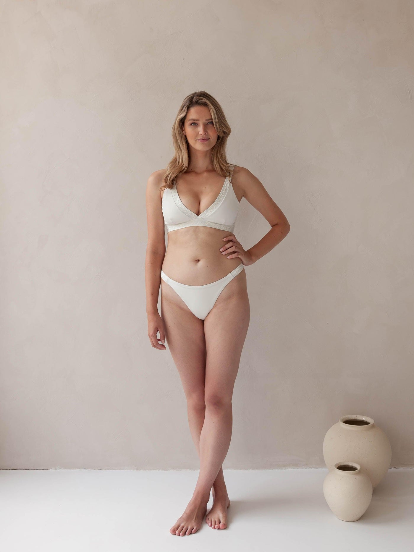 Bikini top Plunge V-neck and V-Shape bottom in white with rib fabric and embroidery, woman front